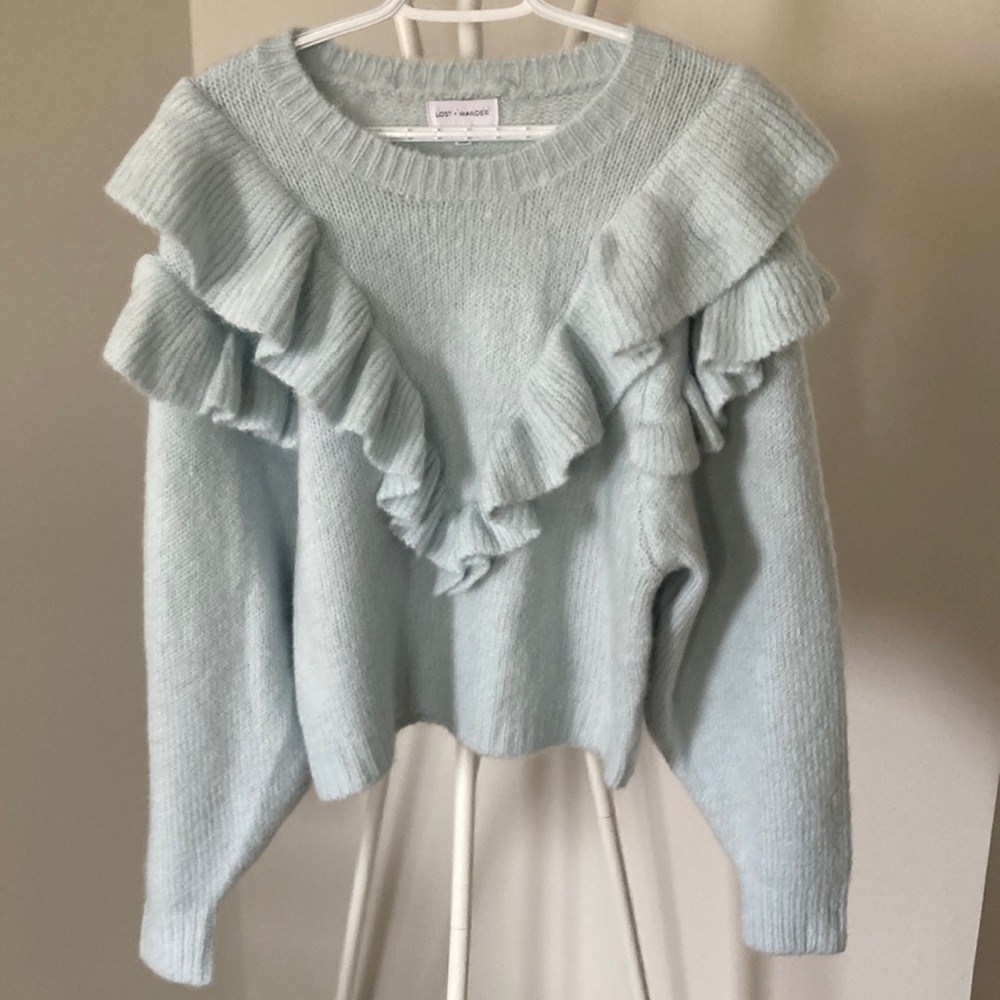 Sweater with ruffles